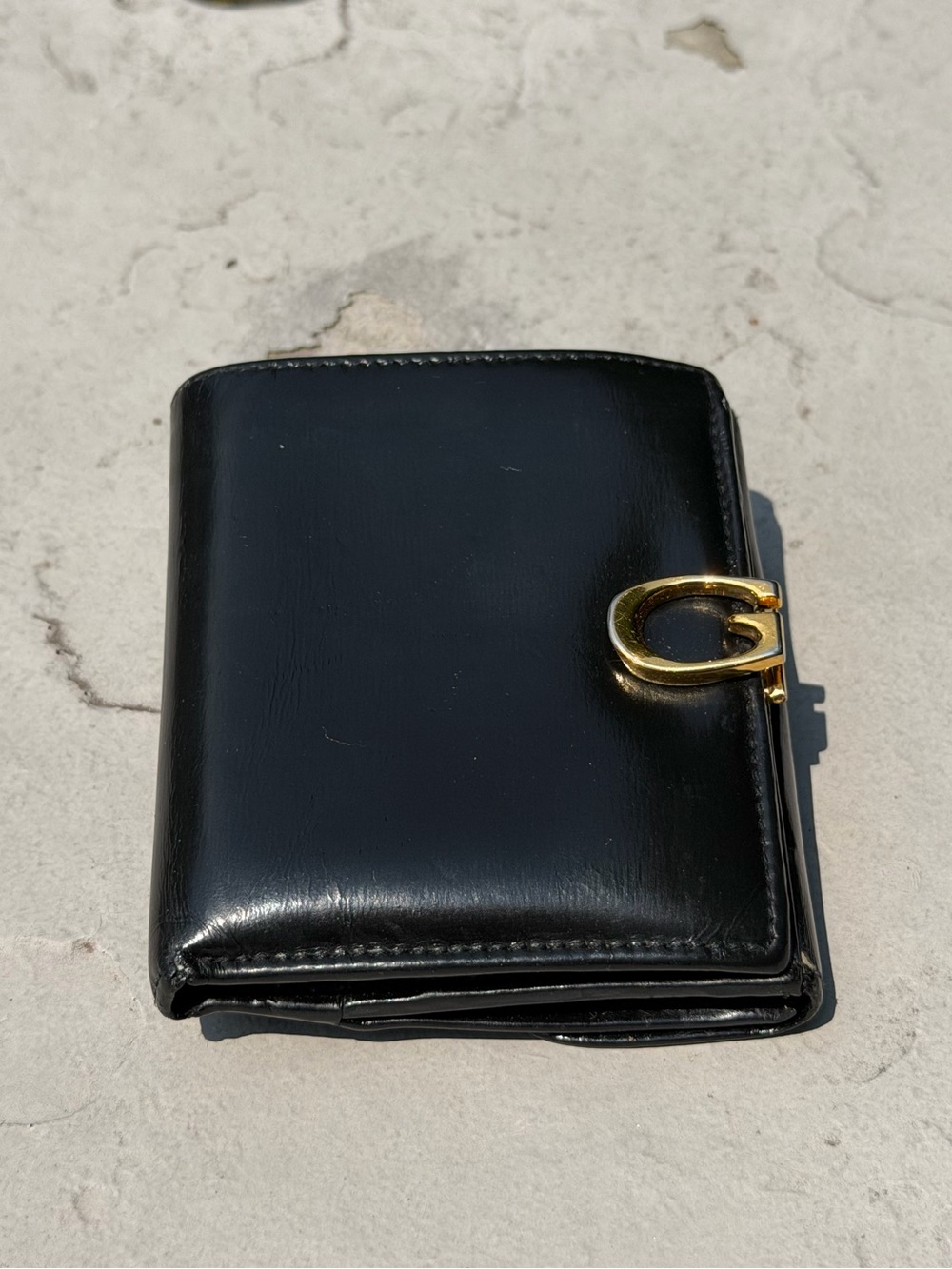 Black Leather Men's Bifold Wallet with Gold G Accent